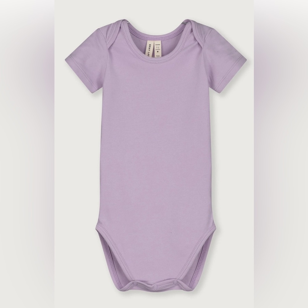 Lightly worn gray label newborn onesie